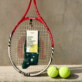 Socks that Support Youth Sports | Green Tennis Rackets